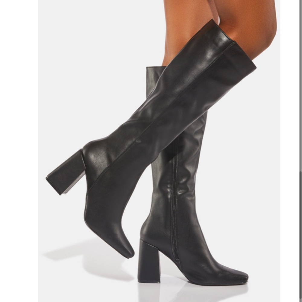 Black leather knee high boots